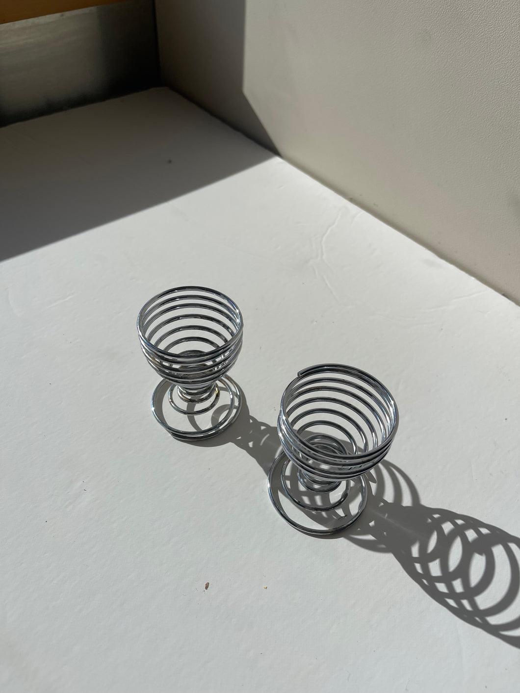 Metal spiral egg holders