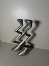 Load image into Gallery viewer, A pair of metal brutalist zig zag candleholders
